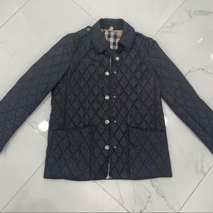 Woman burberry quilted jacket size medium perfect condition worn a few times